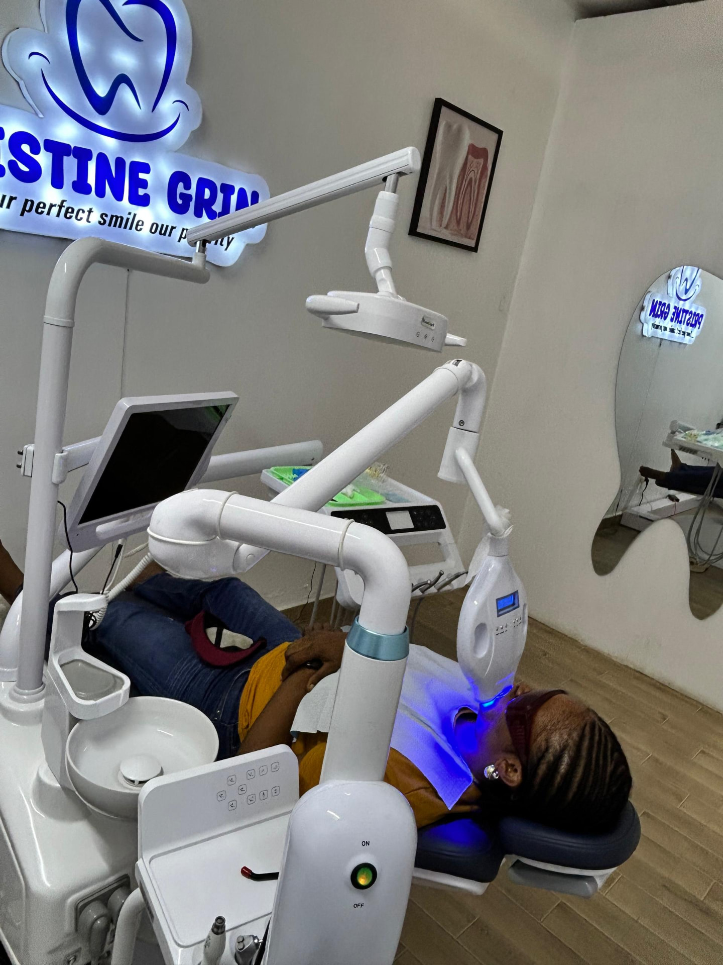 Whitening lamp in use in the treatment room at Pristine Grin Dental